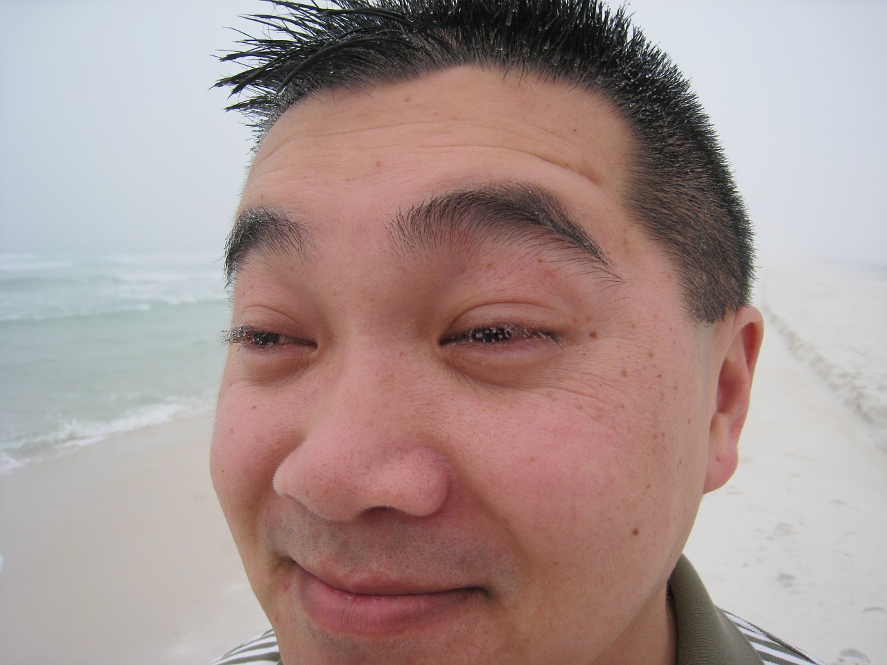 Vacation 2007-12 - Beaches Disney Hotels 0292.jpg - The heavy sea mist condensed on Pauls' eyelashes and hair.